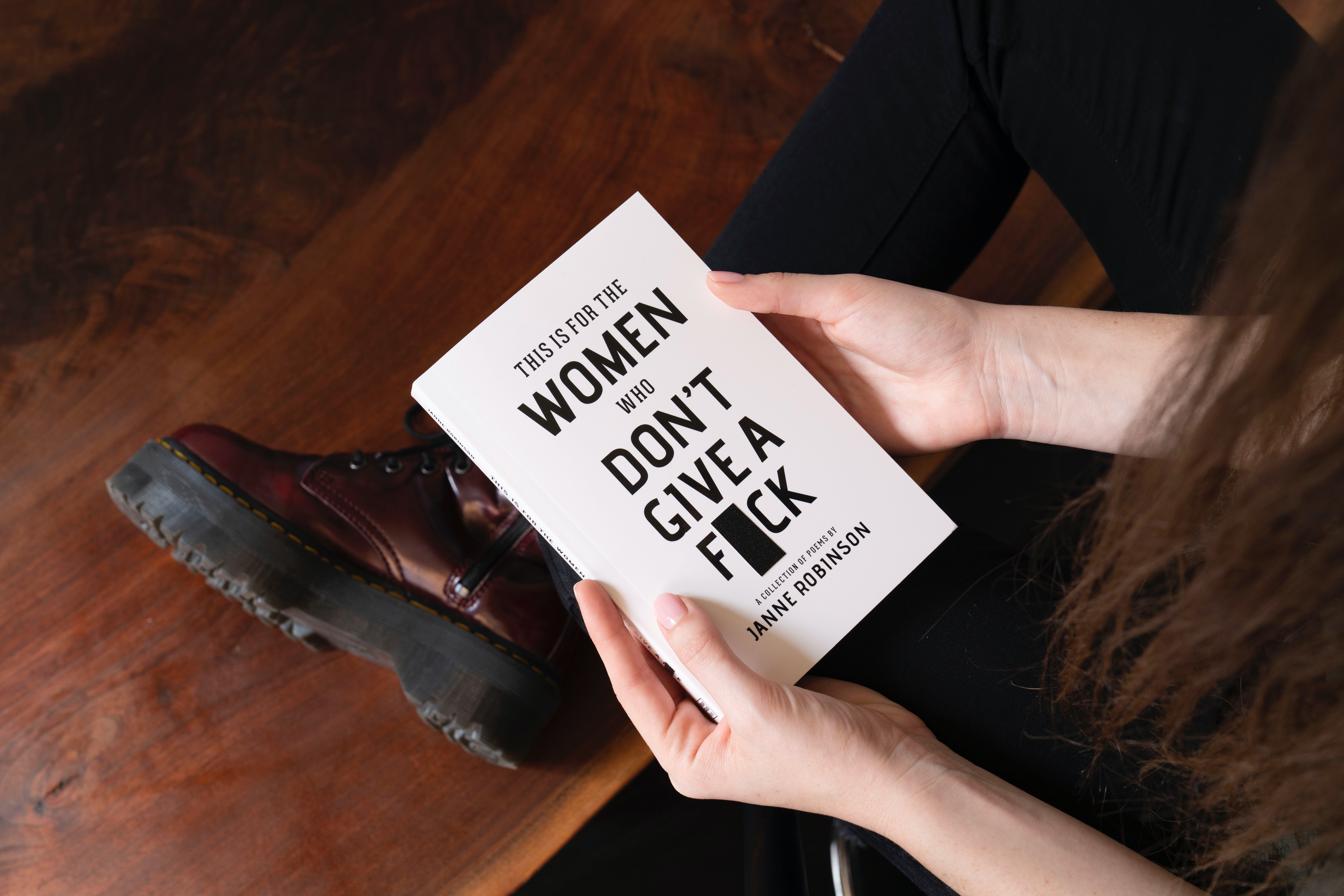 woman-holding-white-book-2228586